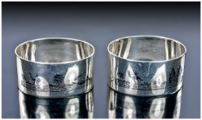 A Pair of Oval Egyptian Silver and Niello Napkin Rings. Each finely decorated in Niello with River