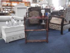 Late Victorian Walnut and Ebonised Wall Rack, c 1885, of three tier form, the two upper tiers