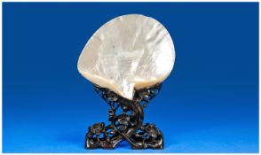 A Large Japanese Mother Of Pearl Style Shell Raised On A Carved Cherry Wood Floral Stand. 11.5`` in