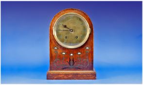 Art Nouveau Oak Cased Mantle Clock, with brass dial, Roman numerals, the case with brass inlay,