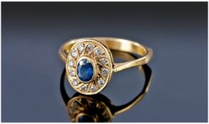 18ct Gold Vintage Diamond & Sapphire Oval Shaped Cluster Ring. Stamped 750.