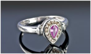 9ct White Gold Diamond Ring, Set With A Central Pear Shaped Pink Sapphire Surrounded By Round Cut