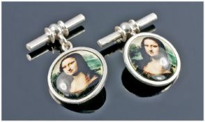 Gents Set Of Silver Cufflinks, Of Oval Form With Chain Links, The Fronts Showing Images Of The Mona