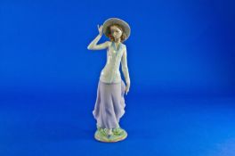 Lladro Figure `Breezy Afternoon` Model number 5682. Issue year 1990. 12.25`` in height.
