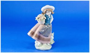 Lladro Figure, `Sweet Scent`, model no. 5221, issued 1984, height 6.25 inches.