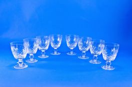 Set of Eight Cut Glass Drinking Glasses, cut bowls, knopped stems, star cut bases, 5 inches high.