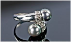 18ct White Gold Pearl And Diamond Ring, Of Cross Over Design Set With Two Bands Of Round Cut