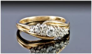 9ct Gold Channel Set Diamond Ring of good quality. The central diamond flanked by 4 diamonds to