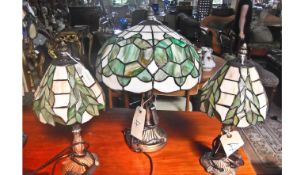 Large Tiffany Style Stained Leaded Table Lamp, together with pair of smaller lamps, the shades in