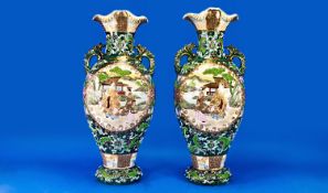 Pair of Early 20th Century Japanese Export Vases, of two-handled form, each with two panels of