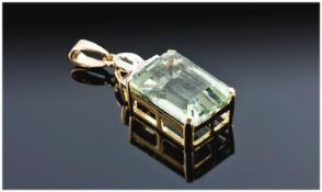 9ct Gold Pendant, Set With a Light Green Emerald Cut Stone, Surmounted By Round Cut Diamonds, Fully