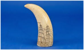 A Mid Nineteenth Century American Saliorwork Scrimshaw decorated Whales Tooth. Incised decoration