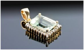 9ct Gold Diamond Pendant, Set With a Pale Emerald Cut Aquamarine Surrounded By Small Round Cut