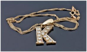 9ct Gold Letter ``K`` Pendant, Set With CZ Stones, Suspended On A 9ct Gold Fine Chain. Fully