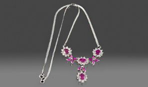 Silver Necklace Set With Ruby And White Faceted Cut Stones, In A Cluster Floral Drop.