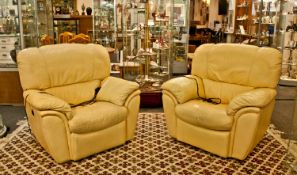 Pair of Modern Cream Leather Reclining Armchairs.