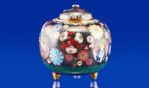 Japanese Lidded Cloisonne Koro Lidded Vase on 3 gilded feet decorated with flowers & fruit in