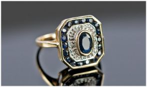 Ladies 9ct Gold Dress Ring, Set With A Central Oval Black Sapphire, Four Round Diamonds And A