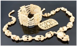 Ivory Elephant Necklace circa 1900. 22`` in length plus ivory bracelet and brooch.