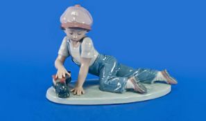 Lladro Collectors Society Figure, 1992, `All Aboard` model number 7619. 5`` in height, 7.25`` in