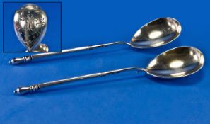 A Heavy Pair Of Russian Silver Serving Spoons. Traditional large fig shaped bowls rising to a