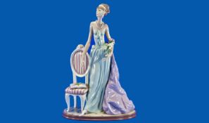 Large Lladro Figure `A Lady of Taste`, dressed in a long, pale grey, strapless evening gown with a