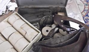 Vintage Ticket Machine, a money bag and a quantity of spare ticket rolls.