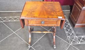 Mahogany Side Table with Lyre shaped supports, terminating in brass lion claw feet. 21 inches high.