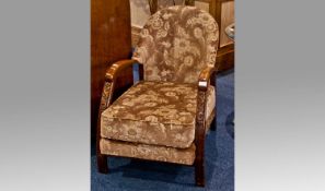 Early 20th Century Oak Longue Chair, with an upholstered seat and back, raised on square legs.