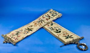 Woolwork and Brass Bell Pull, polychrome floral specimens to full length, with a petit point brown