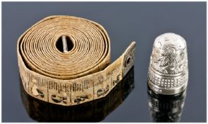 A Size 7 Silver Thimble of Chrysanthemum Head Design, with a waffle girdle. Unmarked, but tests