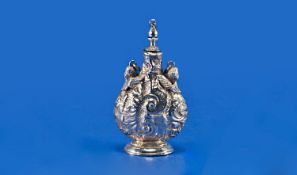 An Unusual Victorian Silver Scent Flask. The main body with cornucopia decoration in relief with