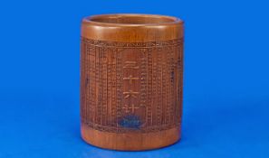 A Large Chinese Bamboo Brushpot, the exterior finely decorated throughout with minute Chinese