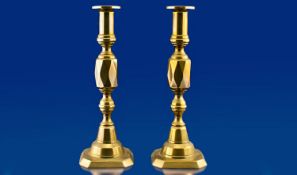 Pair of Late Victorian Brass Candlesticks, the stems with multi-faceted knops, retaining original