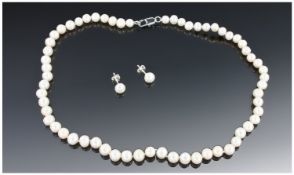White Akoya Pearl Necklace And Matching Earrings.