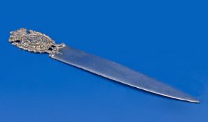 A Good Portugese Silver Paperknife Broad Graduated Blade topped by an armorial and crown finial.