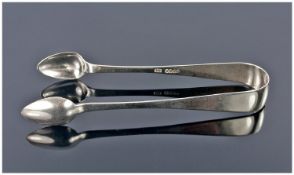 Pair of Silver Sugar Tongs, hallmarked for Dubin 1824, cipher to end.