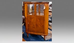 Birds Eye Maple Veneered Corner Cocktail Cabinet, glass fronted, the upper section with glazed