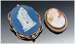 Wedgwood Jasper Ware Cameo, Showing A Classical Figure, Yellow Metal Mount. Together With A Shell