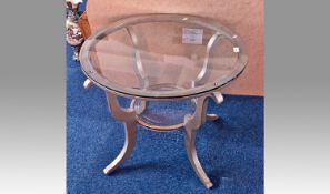 Contemporary Silver Coloured Circular Coffee Table, glass topped, with a lower glass topped tier,