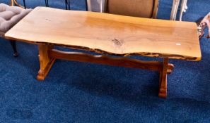 Contemporary Naturalistic Coffee Table, the top made from one piece of timber, probably sycamore,
