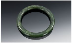 Early 20th Century Spinach Jade Bangle, Diameter 3 Inches. 42 grams.
