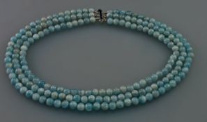 Three Strand Natural Aquamarine Necklace, over 590 carats of the pale blue natural gemstone,