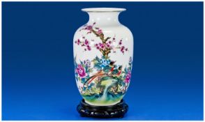 Chinese, Porcelain Vase, with an attractive scene of two exotic birds, perched beneath a flowering