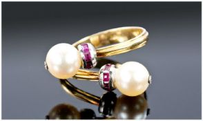 18ct Gold Pearl And Ruby Ring, Of Cross Over Design Set With Two Bands Of Calibre Cut Rubies,