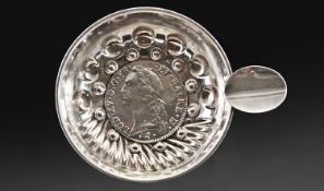 A French Silver Wine Taster. Traditional ribbed form with ring & thumb piece handle. Ludovic 15th