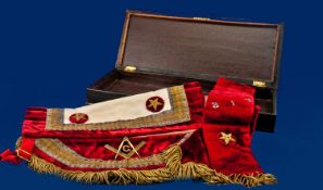 Brown Leather Masonic Case containing a Masonic Case containing a Masonic apron and sash in red