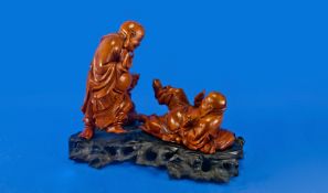 Fine Quality Carved Boxwood Chinese Figure Group of Laughing Buddha Figures: One is reclining on a