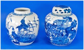 A Rare Pair Of Chinese Blue & White Ginger Jars, finely painted with ducks in flight amongst lily