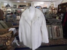 Palomino Shadow Stripe Mink Jacket, self-lined Peter Pan collar plus revers, slit pockets, hook and